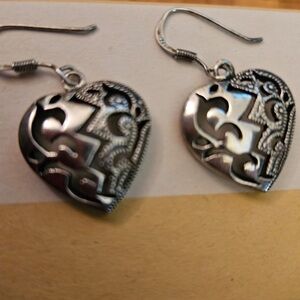 Sterling Silver 925 heart ❤️ shape earings.